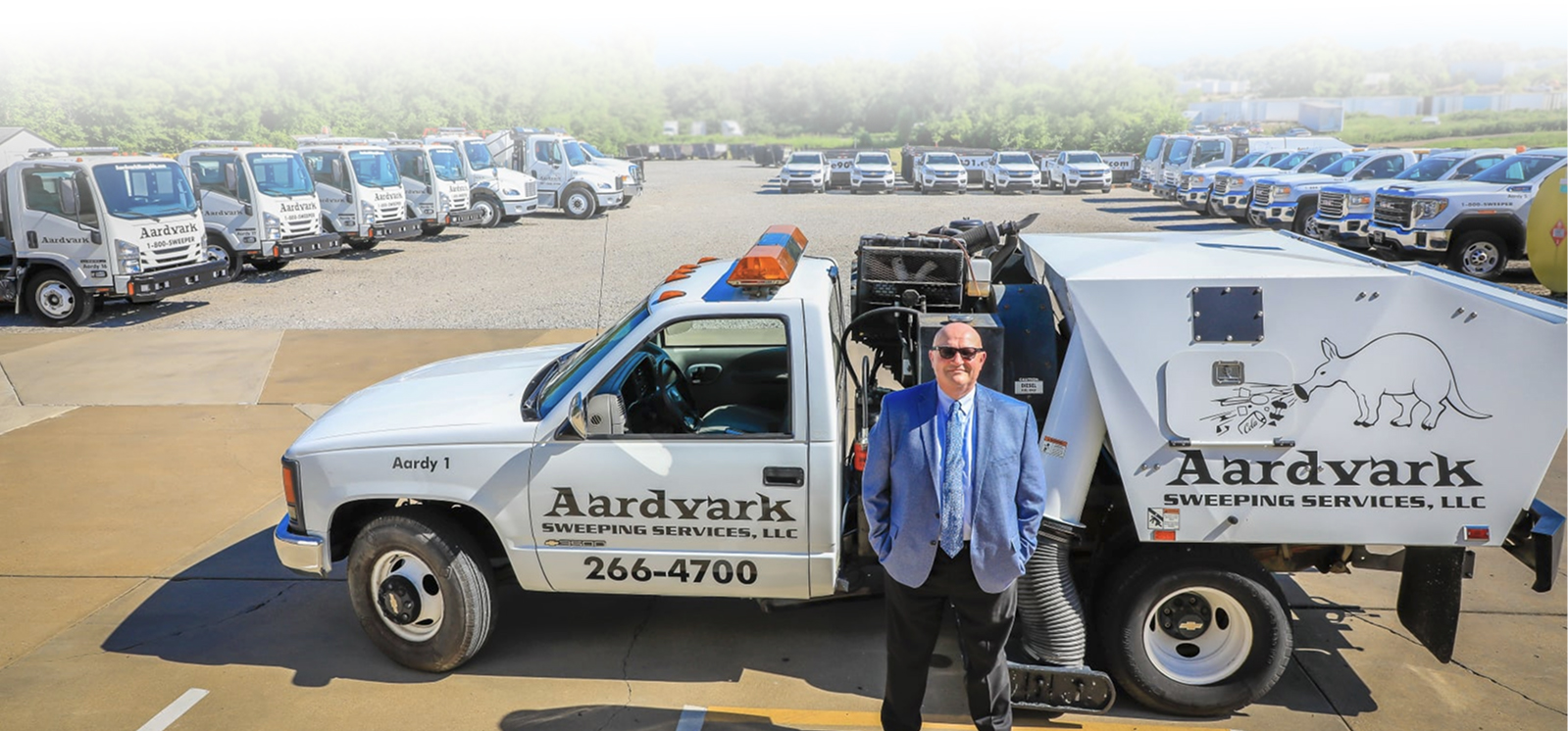Aardvark sweeper truck cleaning a Memphis parking lot